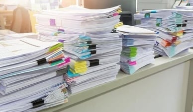 pile-unfinished-documents-on-office-260nw-640049350.jpg copy-2